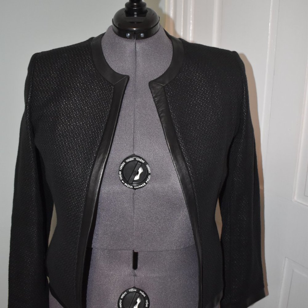 Black tweed jacket with leather lining and pockets